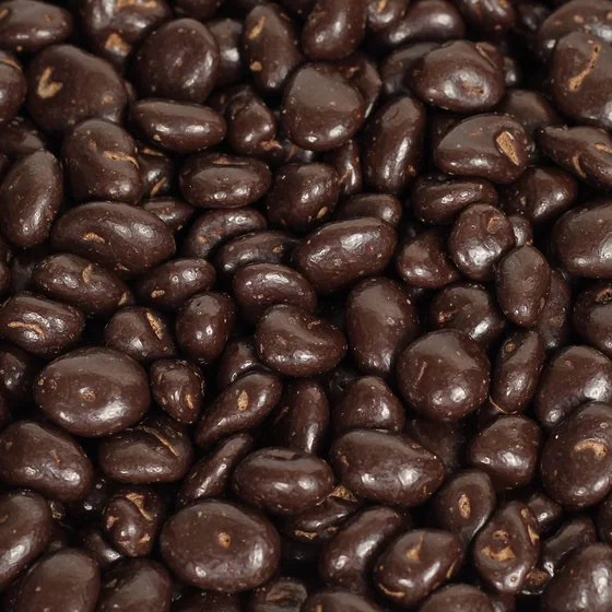 Dark chocolate covered raisins, close up